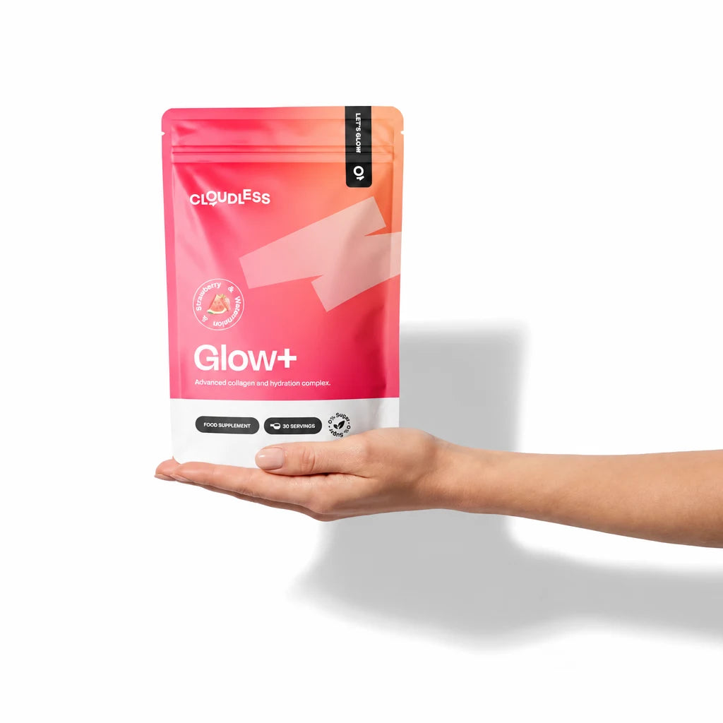 Hand holding a Glow+ pouch